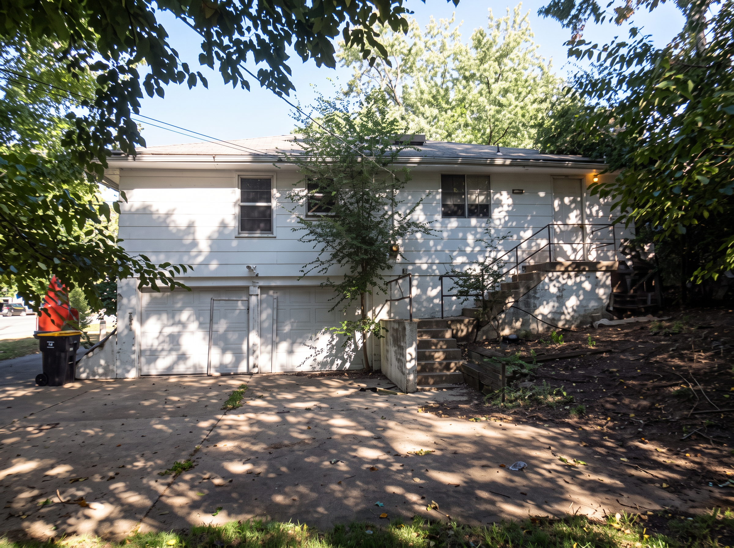 Rear Exterior & Garage — 11500 Manchester Ave