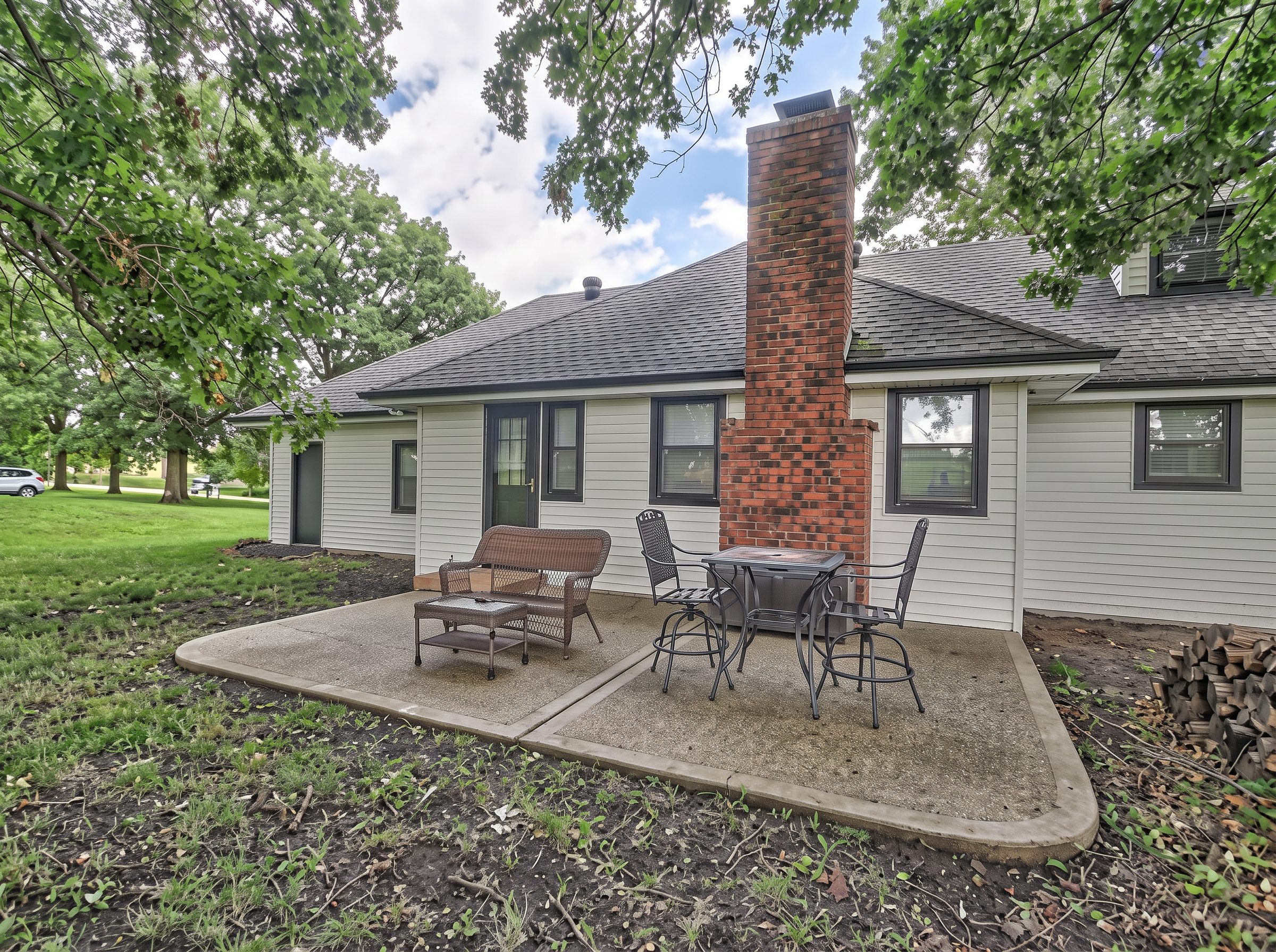Rear Patio & Chimney — 9332 Elm Ave