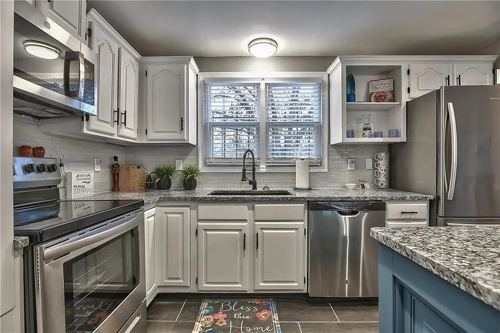 Kitchen & Granite — 3909 E 72nd St
