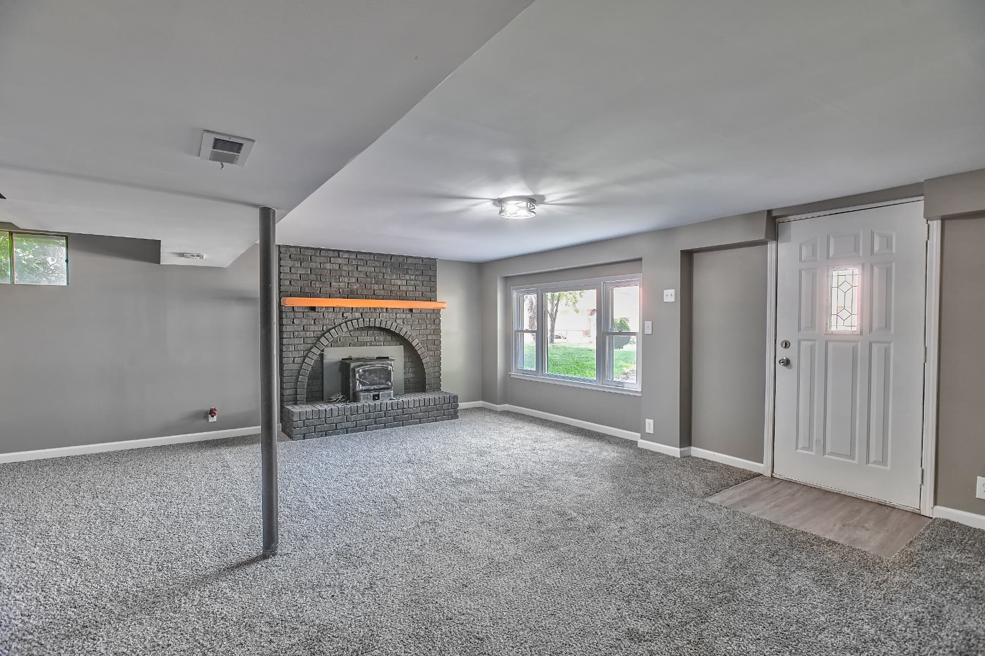 Lower Level Fireplace — 8839 Stark Ave