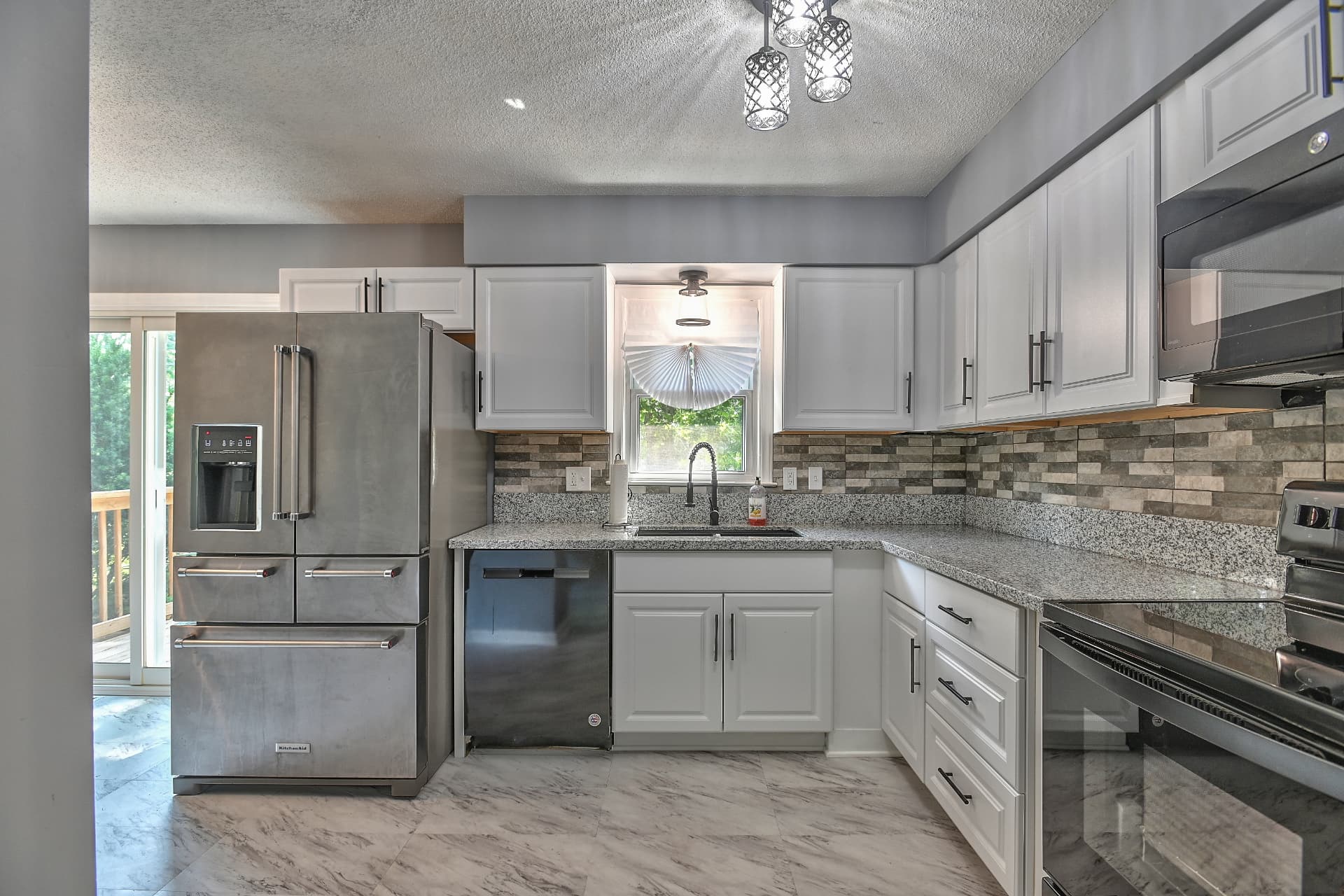 Kitchen & Granite — 8839 Stark Ave
