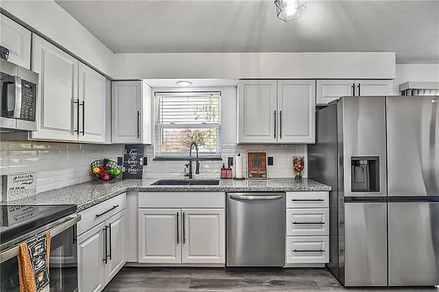 Kitchen & Granite — 307 N Cleveland Ave